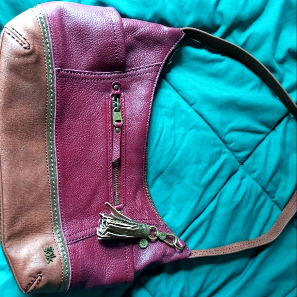 The Sak Maroon Colored Handbag
